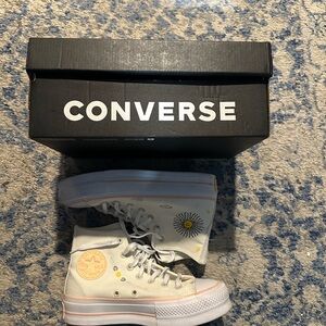 Converse women’s White High-Top Sneakers